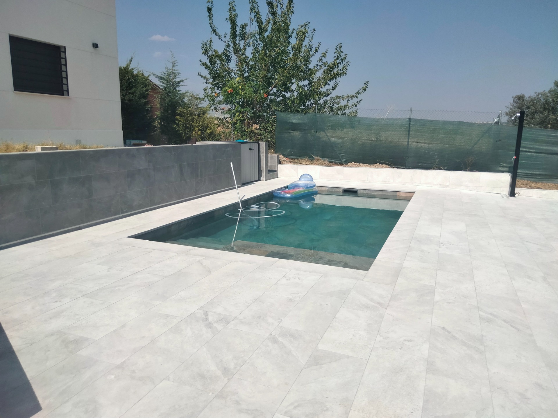 Piscina 7x3,5 porcelanico